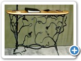 Decorative ironwork consul table